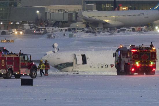 Plane crashes and flips upside down at Toronto airport